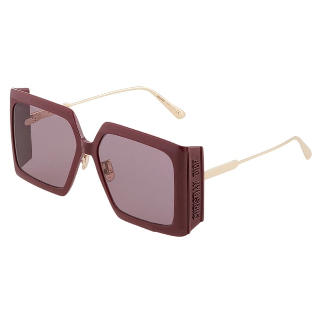 Elevate your style with the Dior DiorSolar sunglasses, featuring a rich burgundy frame paired with elegant Bordeaux lenses. Designed for women who appreciate luxury and sophistication, these sunglasses offer both striking aesthetics and reliable sun protection. The bold color combination enhances any outfit, making them perfect for daytime outings or special occasions. Crafted with Dior's signature attention to detail, these sunglasses provide a comfortable fit and timeless appeal, ensuring you look effortlessly chic while shielding your eyes from harmful rays. Make a statement with Dior's exquisite blend of fashion and function. Made In Italy 100% Plastic