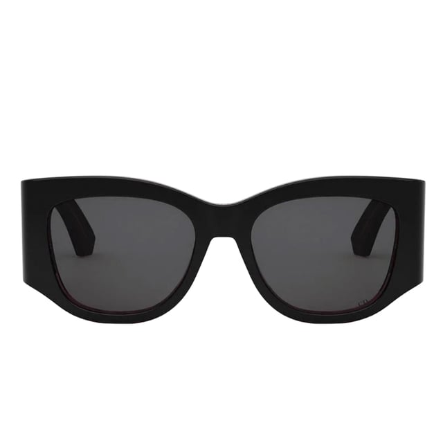 Elevate your style with the Dior Nuit Black Frame Sunglasses, featuring sleek smoke grey lenses that offer both sophistication and subtle mystery. Designed for women who appreciate luxury and modern elegance, these sunglasses provide excellent UV protection while enhancing your look with a timeless black frame. Perfect for any occasion, they combine fashion and function effortlessly, making them a must-have accessory to complete your wardrobe. Experience the perfect blend of comfort, durability, and high-end design with Dior Nuit.Made In Italy 100% Plastic