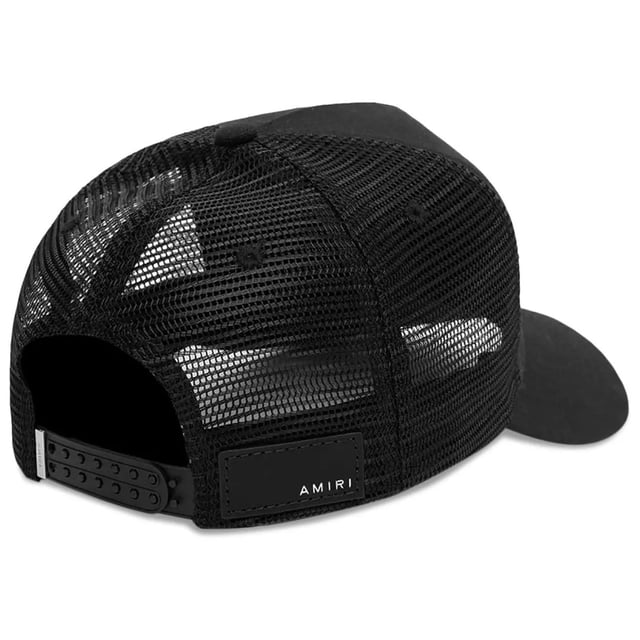 The Amiri MA Logo Black Trucker Hat combines classic style with premium quality, crafted from 100% cotton for lasting comfort and durability. Made in the USA, this hat features the iconic Amiri MA logo, making it a standout accessory for any casual or streetwear outfit. Its breathable fabric and adjustable fit ensure all-day wearability, while the sleek black design adds a versatile edge to your wardrobe. Elevate your look effortlessly with this must-have trucker hat that blends timeless appeal with modern flair