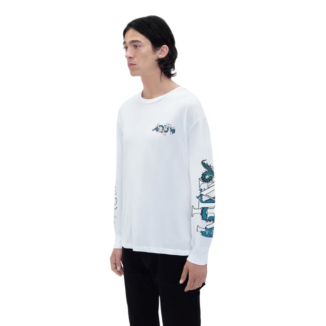 The Amiri LNY Dragon Long Sleeve White T-Shirt combines premium quality with striking design. Crafted from 100% cotton, this shirt offers exceptional comfort and breathability, perfect for everyday wear. Made in the USA, it reflects superior craftsmanship and attention to detail. The bold dragon motif adds a unique, stylish edge that sets you apart, making it an ideal choice for those who appreciate both fashion and quality. Elevate your wardrobe with this versatile long sleeve tee that pairs effortlessly with any outfit while keeping you comfortable all day long