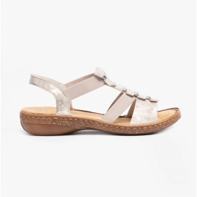 These synthetic women's sandals feature a cross-strap design with a round toe and flat heel, offering comfort for casual wear. They are lightweight and easy to fasten