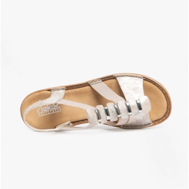 These synthetic women's sandals feature a cross-strap design with a round toe and flat heel, offering comfort for casual wear. They are lightweight and easy to fasten