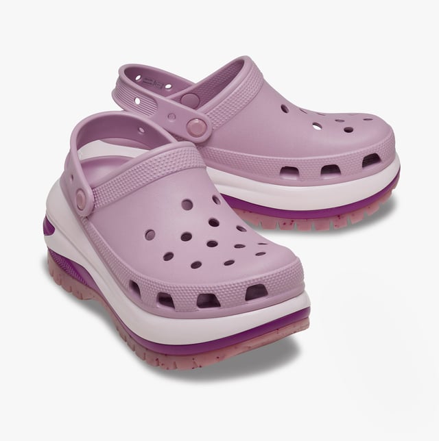These women's slip-on clogs feature Croslite material for comfort and breathability, a platform heel, and a round toe, ideal for casual wear and all-day comfort