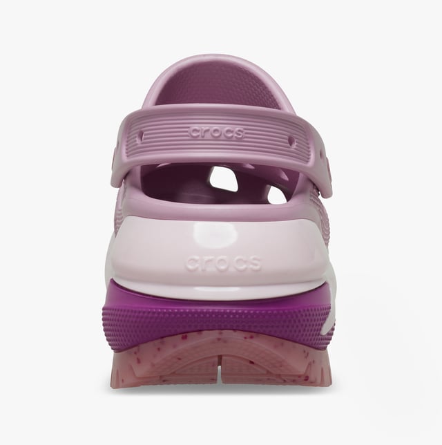 These women's slip-on clogs feature Croslite material for comfort and breathability, a platform heel, and a round toe, ideal for casual wear and all-day comfort