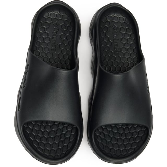 The Columbia Sportswear Thrive slides deliver effortless comfort for men seeking reliable everyday footwear. Crafted with durable rubber construction throughout, these black sandals provide excellent grip and long-lasting performance whether you're poolside, at the gym, or running quick errands. The streamlined design ensures easy slip-on convenience while maintaining Columbia's trusted quality standards. Perfect for active lifestyles demanding both functionality and comfort in a versatile slide silhouette.