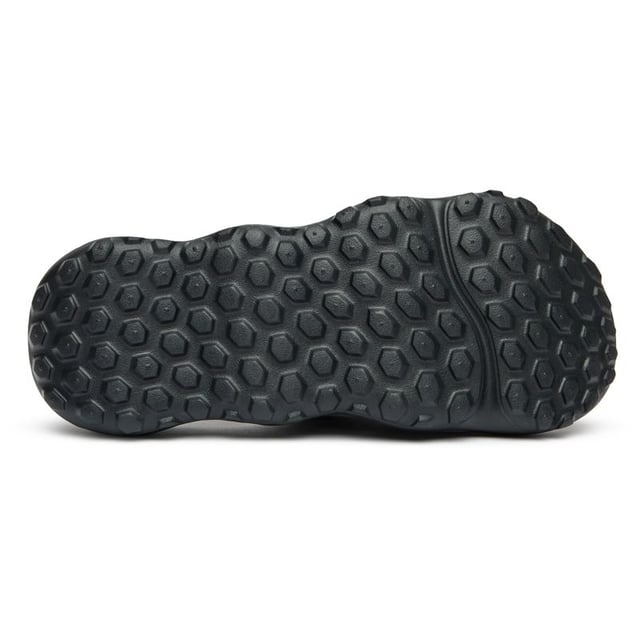 The Columbia Sportswear Thrive slides deliver effortless comfort for men seeking reliable everyday footwear. Crafted with durable rubber construction throughout, these black sandals provide excellent grip and long-lasting performance whether you're poolside, at the gym, or running quick errands. The streamlined design ensures easy slip-on convenience while maintaining Columbia's trusted quality standards. Perfect for active lifestyles demanding both functionality and comfort in a versatile slide silhouette.