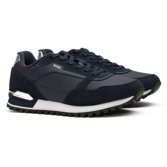 Boss Parkour Trainers The BOSS Parkour trainers fuse style and performance in a striking navy design. Crafted with a luxurious nylon upper that delivers both sophistication and durability, these running-inspired shoes are built for everyday adventures. The lightweight EVA rubber outsole provides excellent traction while reducing fatigue during extended wear. Their sleek profile and premium construction ensure these trainers will remain a versatile staple in your collection, pairing effortlessly with both casual and smart-casual outfits.