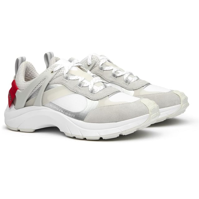 The Hugo Go 2 delivers sophisticated athletic style for the modern man. These white trainers blend performance-inspired design with premium materials, featuring a lightweight nylon upper that ensures breathability and comfort. With their sleek silhouette and rubber outsole providing reliable traction, these versatile HUGO sneakers transition effortlessly from casual outings to active weekends. A refined choice that balances contemporary aesthetics with practical functionality for your everyday wardrobe.