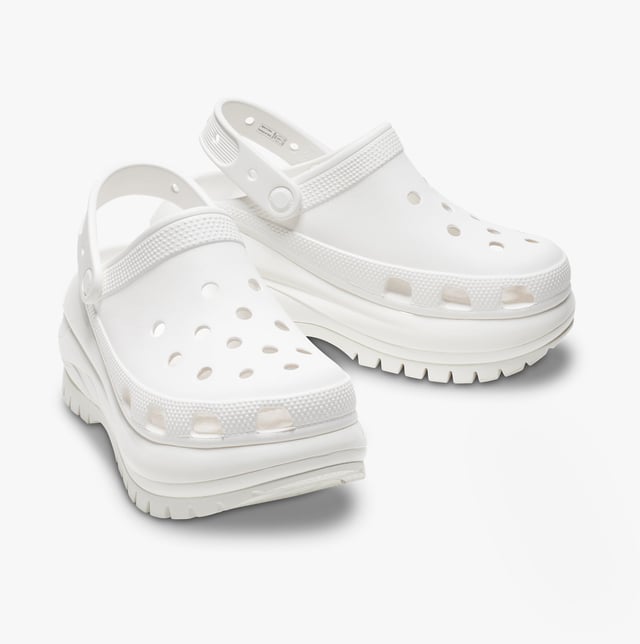 These women's slip-on clogs feature Croslite material for comfort and breathability, a platform heel, and a round toe, ideal for casual wear and all-day ease