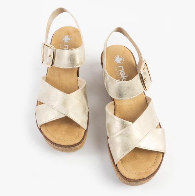 These women's open-toe sandals feature a synthetic upper, textile lining, and a platform heel for comfort and breathability, ideal for casual wear