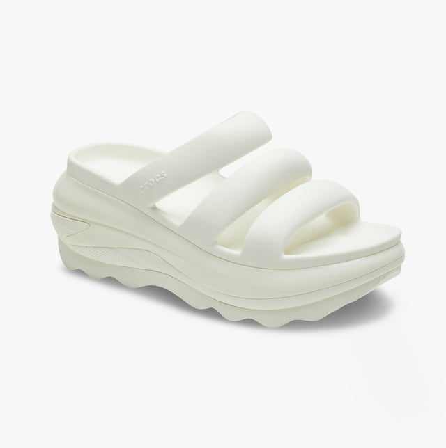 These women's open-toe sliders feature Croslite material for comfort and breathability, with a platform heel and slip-on design, ideal for casual wear