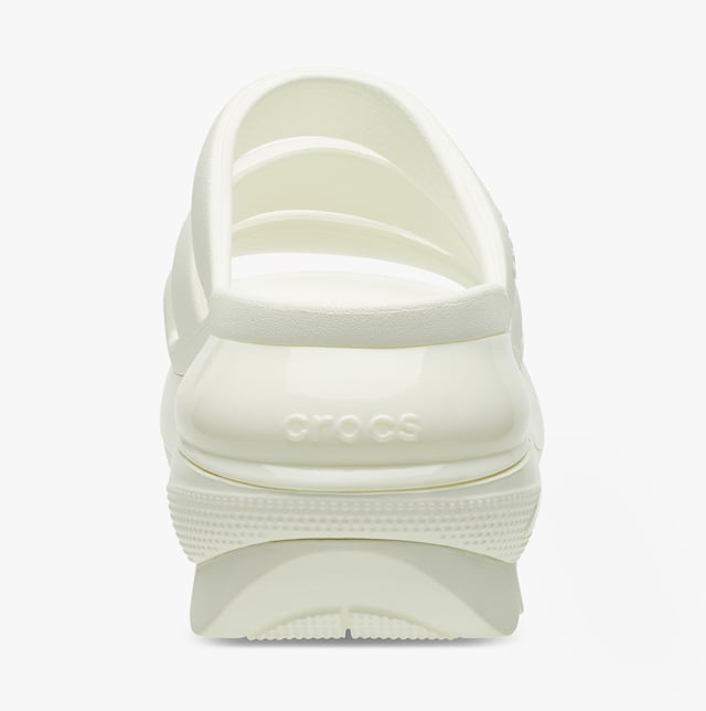 These women's open-toe sliders feature Croslite material for comfort and breathability, with a platform heel and slip-on design, ideal for casual wear