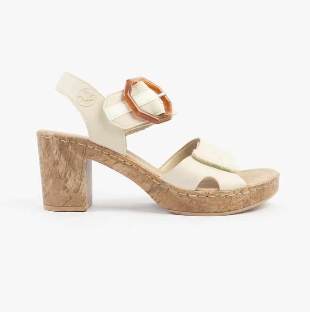 These women's open-toe sandals feature a synthetic upper, breathable lining, and a comfortable block heel. Ideal for casual wear with a relaxed fit and easy touch fasten closure