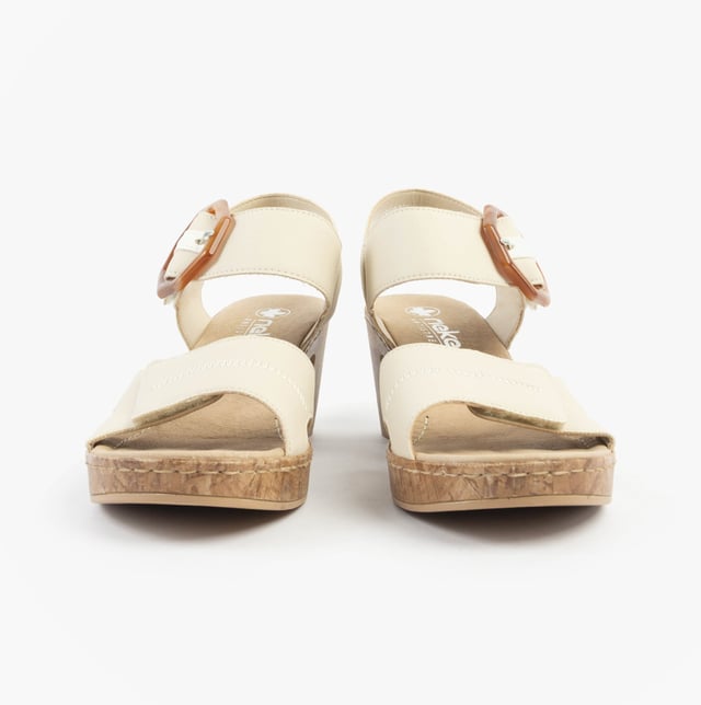 These women's open-toe sandals feature a synthetic upper, breathable lining, and a comfortable block heel. Ideal for casual wear with a relaxed fit and easy touch fasten closure