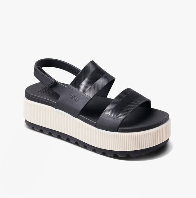 These open-toe women's sandals feature a synthetic upper, EVA lining and sole, a low platform heel, and a touch fasten closure, offering comfortable casual wear