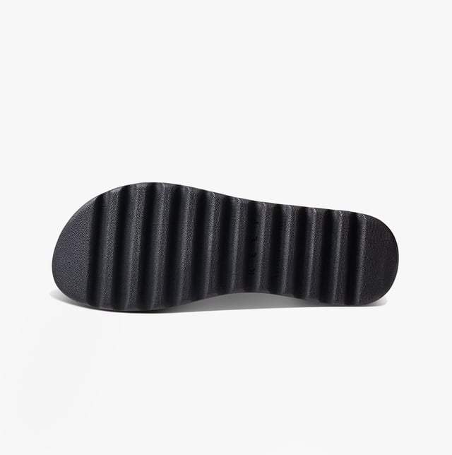 These open-toe women's sandals feature a synthetic upper, EVA lining and sole, a low platform heel, and a touch fasten closure, offering comfortable casual wear