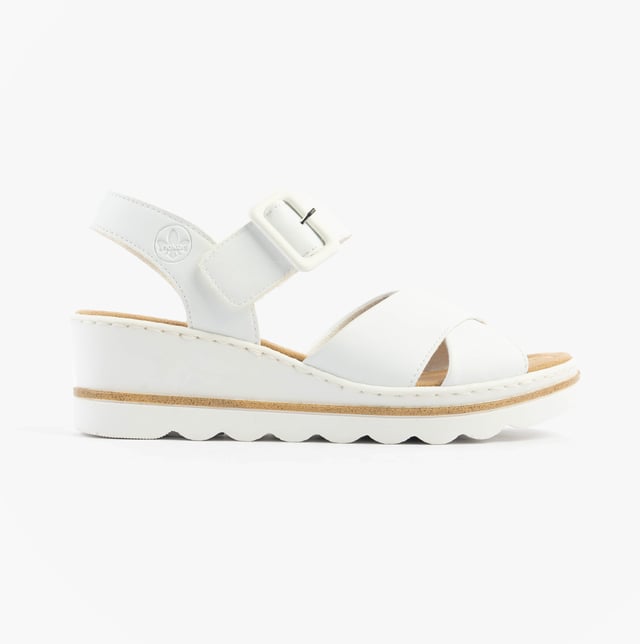 These women's wedge sandals feature a synthetic upper, breathable textile lining, and a PU sole for comfort. Ideal for casual wear with a relaxed fit and secure buckle closure