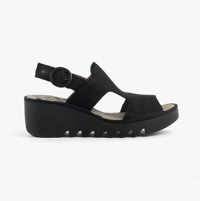 These open-toe wedge sandals feature a leather upper and lining with a TPR sole, offering comfort and breathability for casual wear