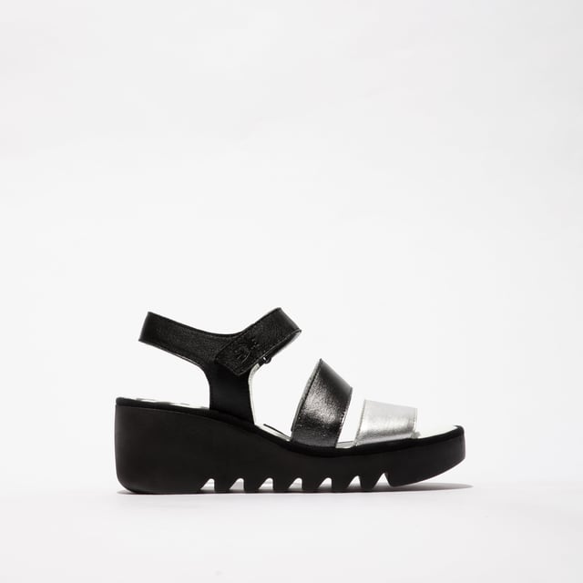 Open-toe wedge sandals crafted from breathable leather with a rubber sole and touch fasten, offering casual comfort for everyday wear