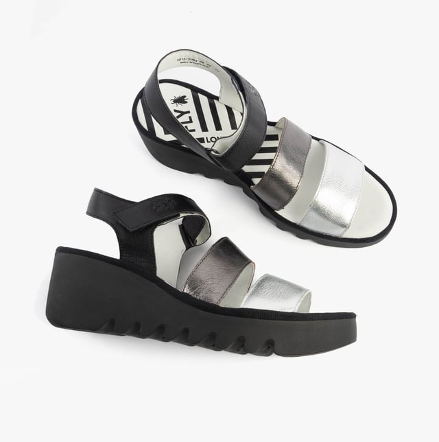 Open-toe wedge sandals crafted from breathable leather with a rubber sole and touch fasten, offering casual comfort for everyday wear