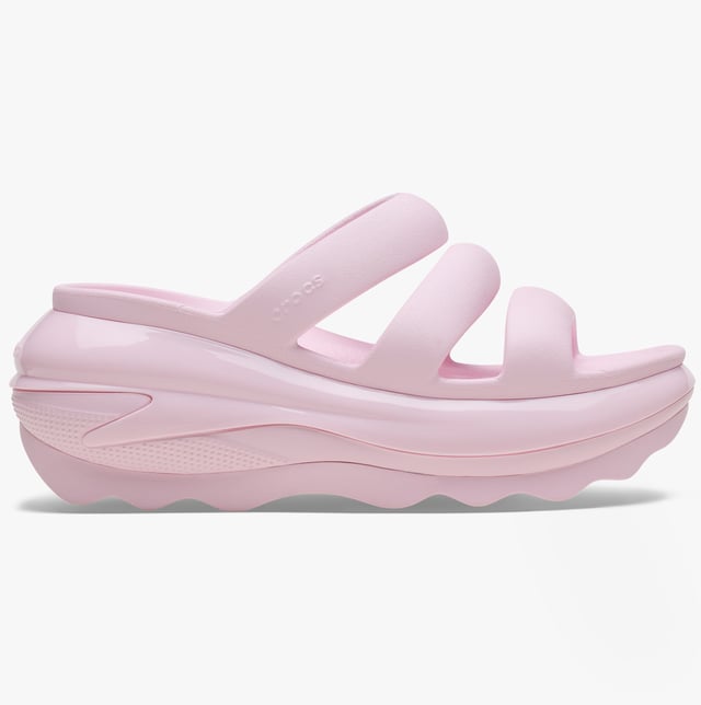 These women's open-toe sliders feature Croslite lining and sole, a platform heel, and a triple strap design, offering casual comfort for everyday wear