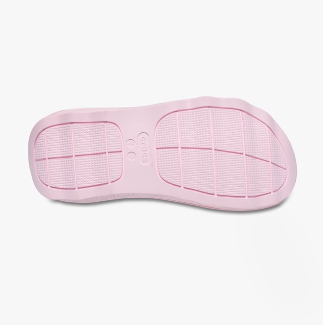 These women's open-toe sliders feature Croslite lining and sole, a platform heel, and a triple strap design, offering casual comfort for everyday wear