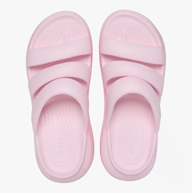 These women's open-toe sliders feature Croslite lining and sole, a platform heel, and a triple strap design, offering casual comfort for everyday wear