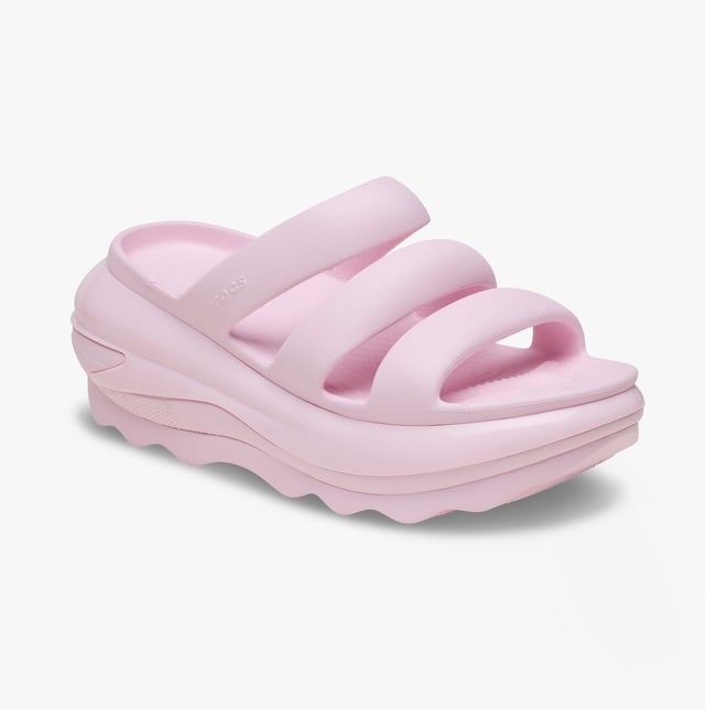 These women's open-toe sliders feature Croslite lining and sole, a platform heel, and a triple strap design, offering casual comfort for everyday wear