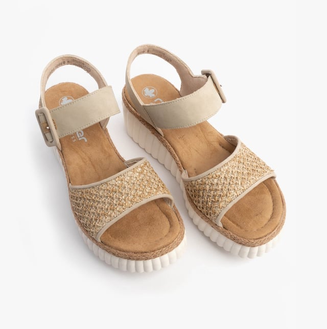 These women's wedge sandals feature a synthetic upper, textile lining, and RIRICON sole, offering comfort and an open toe design, ideal for casual wear