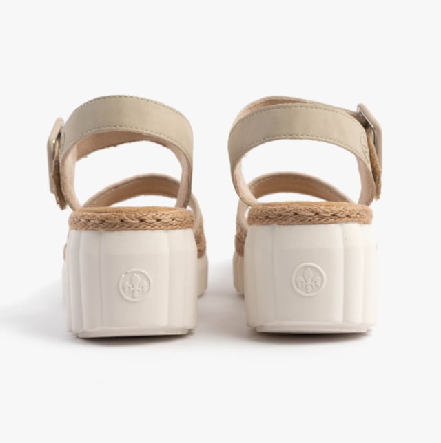These women's wedge sandals feature a synthetic upper, textile lining, and RIRICON sole, offering comfort and an open toe design, ideal for casual wear