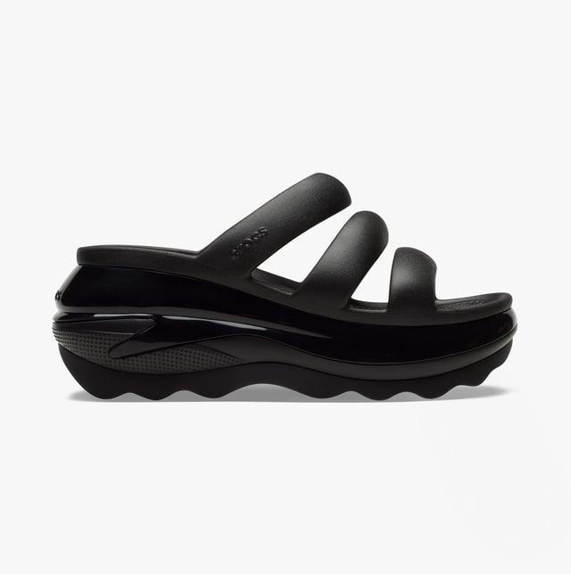 These women's slip-on sliders feature Croslite material for comfort and breathability, a platform heel, and an open toe design, ideal for casual wear