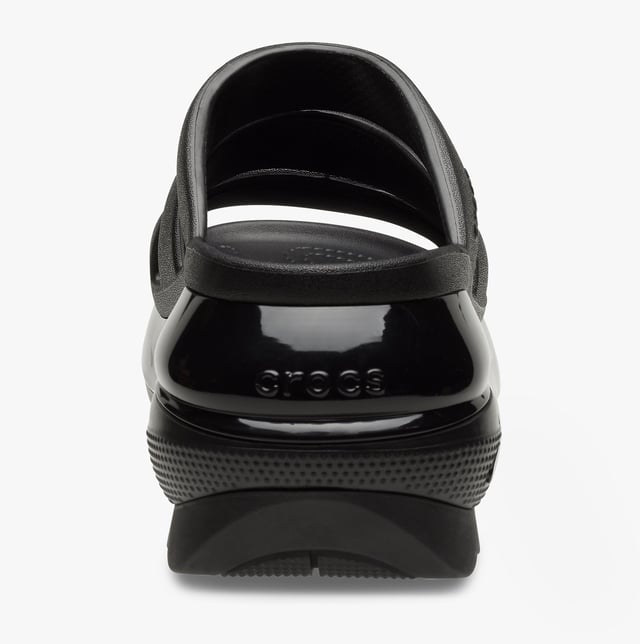 These women's slip-on sliders feature Croslite material for comfort and breathability, a platform heel, and an open toe design, ideal for casual wear