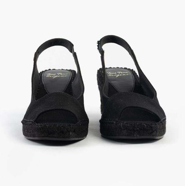 These women's slip-on sandals feature a textile upper and lining, rubber sole, low wedge heel, and open toe design, offering comfort and vegan-friendly style for casual wear
