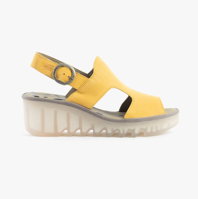 These open-toe wedge sandals feature a leather upper and lining with a breathable design, a TPR sole, and buckle closure, offering comfort for casual wear
