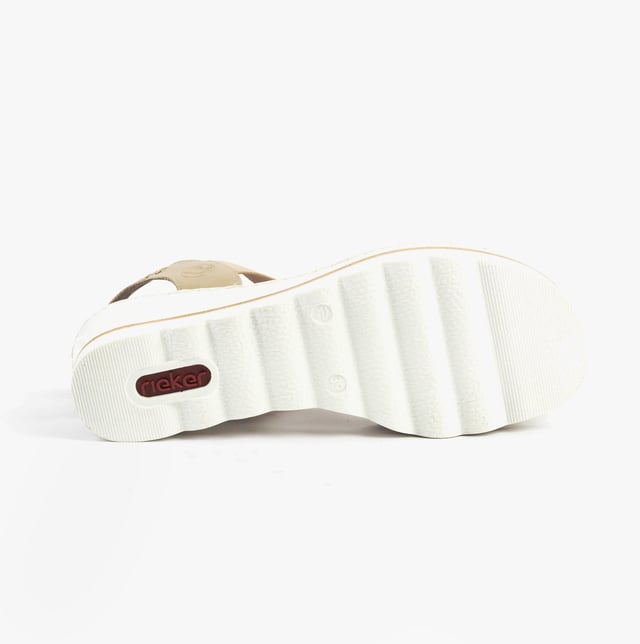 These women's wedge sandals feature a synthetic upper, breathable textile lining, and a slip-on design. Lightweight and comfortable, ideal for casual warm-weather wear