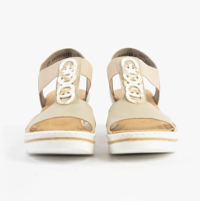 These women's wedge sandals feature a synthetic upper, breathable textile lining, and a slip-on design. Lightweight and comfortable, ideal for casual warm-weather wear