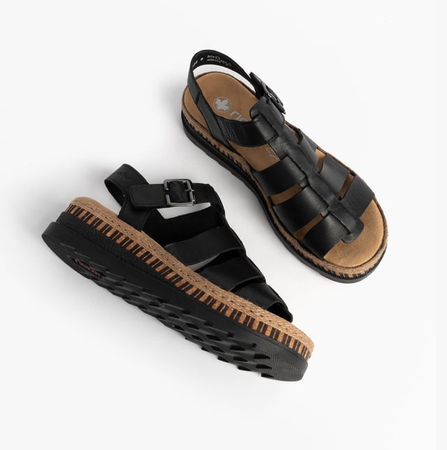 These women's open-toe wedge sandals feature coated leather uppers, breathable lining, and a PU sole, offering comfort and a secure buckle closure for casual wear