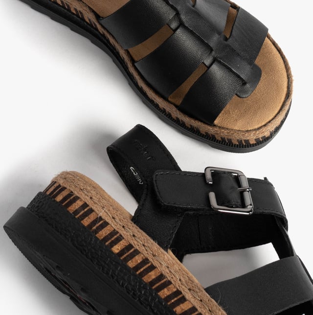 These women's open-toe wedge sandals feature coated leather uppers, breathable lining, and a PU sole, offering comfort and a secure buckle closure for casual wear