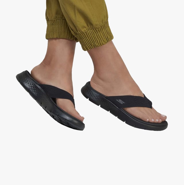 Knit upper slip-on sandals with a platform heel, rubber lining and sole, offering comfort and a relaxed fit. Ideal for casual wear and vegan-friendly styling