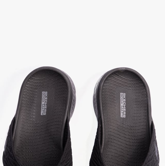 Knit upper slip-on sandals with a platform heel, rubber lining and sole, offering comfort and a relaxed fit. Ideal for casual wear and vegan-friendly styling