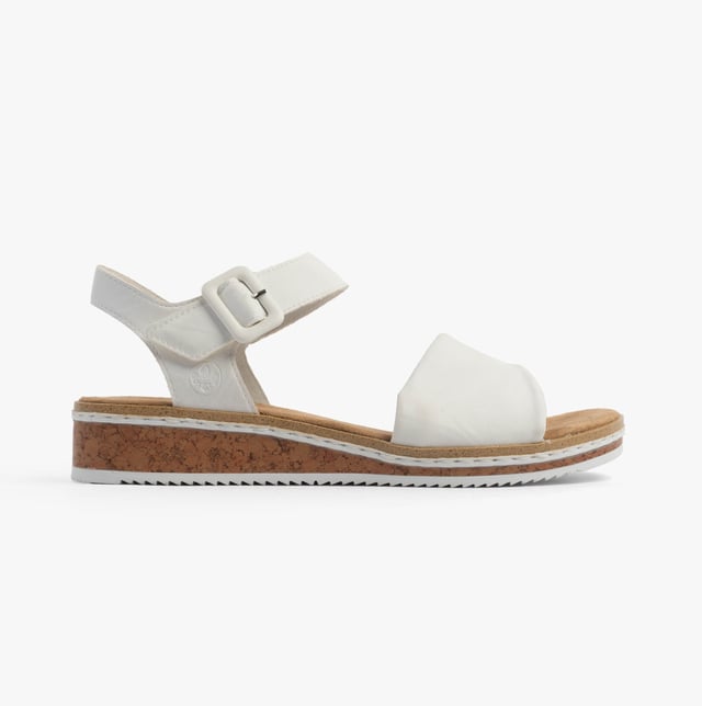 These women's open-toe wedge sandals feature a synthetic upper, breathable lining, and a RIRICON sole for comfort. Ideal for casual wear with a relaxed fit