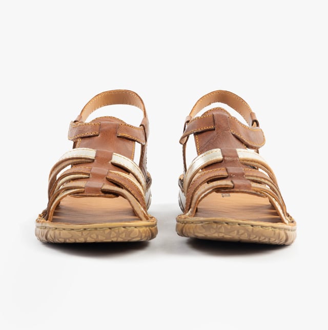These lightweight leather fisherman's sandals feature a multi-tone design, rubber sole, and touch fasten for casual comfort and easy wear