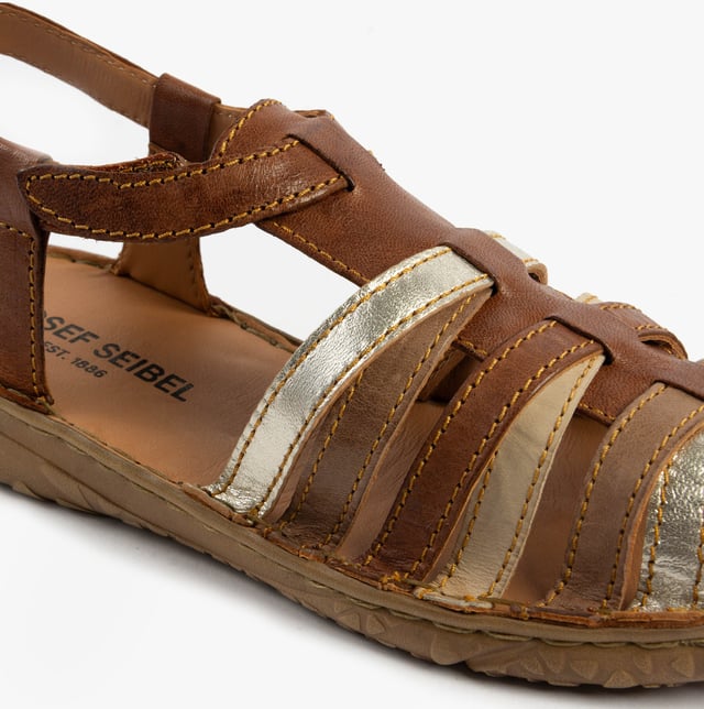 These lightweight leather fisherman's sandals feature a multi-tone design, rubber sole, and touch fasten for casual comfort and easy wear