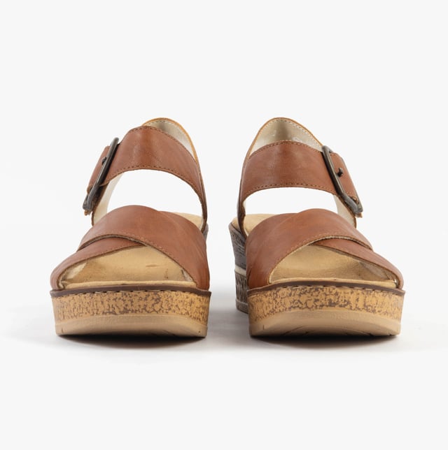 These women's open-toe sandals feature a synthetic upper, textile lining, and a platform heel for comfort and breathability, ideal for casual wear