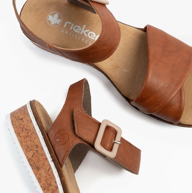 These women's open-toe wedge sandals feature a synthetic upper, breathable lining, and a RIRICON sole for comfort and casual wear