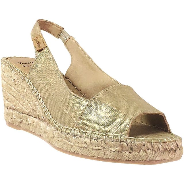 These slip-on wedge sandals feature a textile upper and lining with a rubber sole, offering comfort and vegan-friendly design, perfect for casual wear