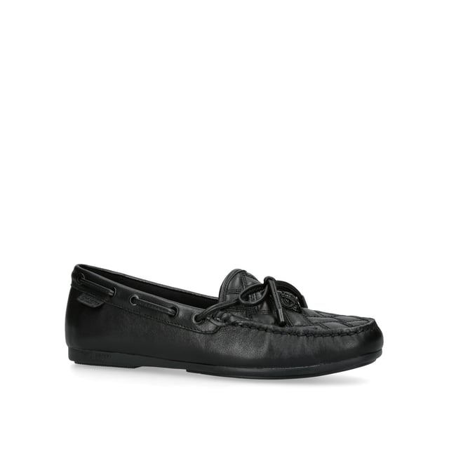The Eagle Moccasin from Kurt Geiger is crafted from a black leather in an all-drench design. The toe features an overstitched quilt and a black eagle head.