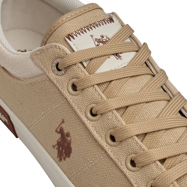 These US Polo Assn. sneakers combine casual style and everyday comfort. With a versatile design and iconic brand details, they're ideal for a relaxed look without losing personality.\n\n Details:\n - Durable canvas upper with reinforcements in key areas; some models come with leather, synthetic leather, and suede combination uppers.\n - Padded textile inner lining for greater comfort.\n - Flat laces and metal eyelets for a secure fit.\n - Non-slip rubber sole with institutional detail on the side.\n - Logo on the side as a distinctive seal.\n\n A comfortable and timeless option for those looking for lightweight footwear with a sporty style and urban essence. These men's casual sneakers are perfect for completing a casual look with the authentic seal of the US Polo Association.\n Composition: Exterior: Leather, Textile, Suede; Interior: Textile; Sole: Synthetic\n Care:\nClean with a soft brush and neutral soap.\n Avoid machine washing.\n Air dry, away from direct sunlight.