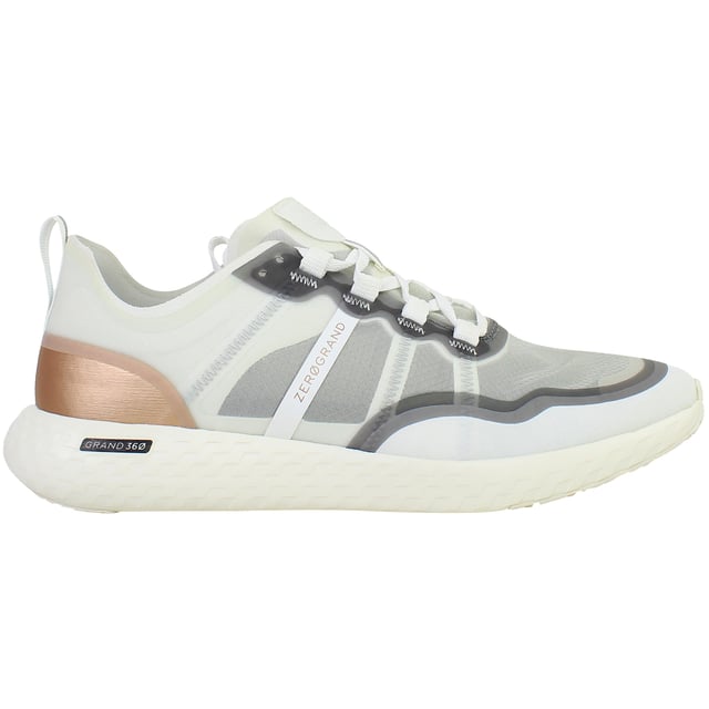 Engineered for performance and styled for versatility, the Cole Haan ZERØGRAND Outpace Women’s Running Shoes in White deliver responsive comfort, lightweight agility, and a clean, modern silhouette. Whether you're racking up miles or heading into your day, these trainers are built to move with you—effortlessly and in style.
Key Features
Breathable Mesh Upper

Lightweight and flexible with enhanced airflow to keep feet cool and comfortable through workouts or daily wear.

ZERØGRAND Cushioned Midsole

Advanced EVA midsole absorbs shock and adds bounce with every step, offering a plush ride on the go.

Stabilizing Internal Heel Counter

Supports the rear foot for better alignment and reduced fatigue during long runs or walks.

Durable Rubber Traction Pods

Strategically placed outsole rubber ensures grip and durability without adding excess weight.

Padded Collar and Tongue

Adds ankle comfort and reduces pressure points for a secure, supported feel.

Lace-Up Closure

Classic lacing system for an adjustable and snug fit.

All-White Colourway

Clean and versatile—pairs effortlessly with activewear, athleisure, or street-style outfits.

From morning jogs to afternoon errands, the Cole Haan ZERØGRAND Outpace Women’s White Running Shoes combine athletic performance with everyday wearability—designed to help you go further, faster, and in flawless style.