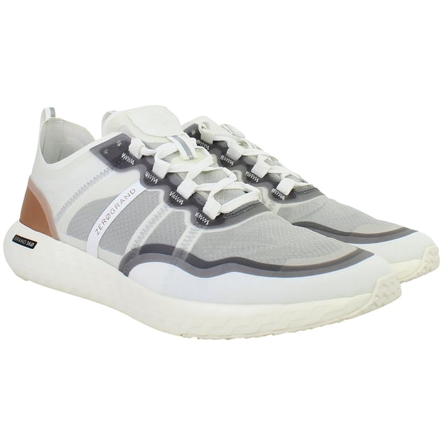 Engineered for performance and styled for versatility, the Cole Haan ZERØGRAND Outpace Women’s Running Shoes in White deliver responsive comfort, lightweight agility, and a clean, modern silhouette. Whether you're racking up miles or heading into your day, these trainers are built to move with you—effortlessly and in style.
Key Features
Breathable Mesh Upper

Lightweight and flexible with enhanced airflow to keep feet cool and comfortable through workouts or daily wear.

ZERØGRAND Cushioned Midsole

Advanced EVA midsole absorbs shock and adds bounce with every step, offering a plush ride on the go.

Stabilizing Internal Heel Counter

Supports the rear foot for better alignment and reduced fatigue during long runs or walks.

Durable Rubber Traction Pods

Strategically placed outsole rubber ensures grip and durability without adding excess weight.

Padded Collar and Tongue

Adds ankle comfort and reduces pressure points for a secure, supported feel.

Lace-Up Closure

Classic lacing system for an adjustable and snug fit.

All-White Colourway

Clean and versatile—pairs effortlessly with activewear, athleisure, or street-style outfits.

From morning jogs to afternoon errands, the Cole Haan ZERØGRAND Outpace Women’s White Running Shoes combine athletic performance with everyday wearability—designed to help you go further, faster, and in flawless style.